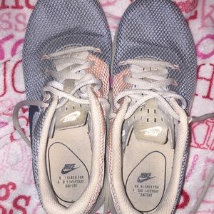 blue and red nike’s